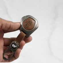 Load image into Gallery viewer, Metal Alloy Leather Key case for Maruti Suzuki  S-Presso | Baleno | Fronx | Alto-800 | Ignis | Swift | Celerio | S-Cross | Ritz | Ciaz | SX4 | Ertiga | Wagon-R | XL 6 | Dezire | Vitara Brezza (2 Button Flip Key) - Tan