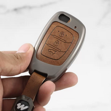 Load image into Gallery viewer, Metal Alloy Leather Key case for Hyundai Aura | Exter | Venue | Nios | Xcent | i20 Active | i20 Elite | Creta (3 Button Flip Key) (TAN)