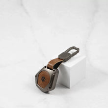 Load image into Gallery viewer, Metal Alloy Leather Key case for Maruti Suzuki  S-Presso | Baleno | Fronx | Alto-800 | Ignis | Swift | Celerio | S-Cross | Ritz | Ciaz | SX4 | Ertiga | Wagon-R | XL 6 | Dezire | Vitara Brezza (2 Button Flip Key) - Tan