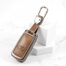 Load image into Gallery viewer, Metal Alloy Leather Key case for Tata Harrier | Punch | Tigor | Bolt | Nexon | Hexa | Zest | Tiago (3 Button Flip Key) (TAN)