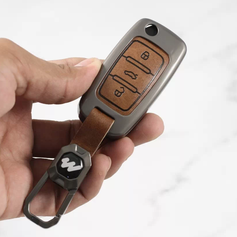 Metal Alloy Leather Key case for Skoda Rapid | Yeti | Superb | Laura | Fabia | Octavia 2014 | Volkswagen Jetta | Vento | Polo | Ameo3 Button Flip Key (TAN)