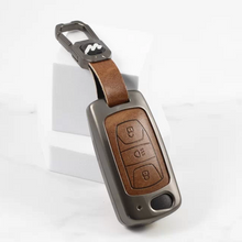 Load image into Gallery viewer, Metal Alloy Leather Key case for Tata Harrier | Punch | Tigor | Bolt | Nexon | Hexa | Zest | Tiago (3 Button Flip Key) (TAN)
