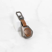 Load image into Gallery viewer, Metal Alloy Leather Key case for Maruti Suzuki  S-Presso | Baleno | Fronx | Alto-800 | Ignis | Swift | Celerio | S-Cross | Ritz | Ciaz | SX4 | Ertiga | Wagon-R | XL 6 | Dezire | Vitara Brezza (2 Button Flip Key) - Tan