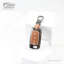 Load image into Gallery viewer, Carloginn Luxury Zinc Alloy Metal Soft Silicon Key Case for Tata Harrier | Punch | Tigor | Bolt | Nexon | Hexa | Zest | Tiago (3 Button Flip Key)- TAN COLOR