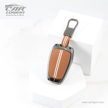 Load image into Gallery viewer, Zinc Alloy Metal Soft Silicon Key Case for Tata Altroz | Punch | Tiago | Bolt | Harrier | Tigor | Gravitas | Nexon | New Safari 4 Button Smart Key - TAN COLOR
