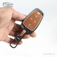 Load image into Gallery viewer, Zinc Alloy Metal Soft Silicon Key Case for Tata Altroz | Punch | Tiago | Bolt | Harrier | Tigor | Gravitas | Nexon | New Safari 4 Button Smart Key - TAN COLOR