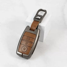 Load image into Gallery viewer, Metal Leather Car Keycover for KIA Seltos | Sonet | Carens - (3 Button Smart Key)