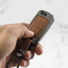 Metal Alloy Leather Key case for Tata Harrier | Punch | Tigor | Bolt | Nexon | Hexa | Zest | Tiago (3 Button Flip Key) (TAN)