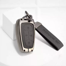 Load image into Gallery viewer, Metal Alloy Leather Key case for Tata Altroz | Punch | Tiago | Bolt | Harrier | Tigor | Gravitas | Nexon | New Safari 4 Button Smart Key