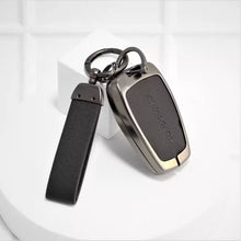 Load image into Gallery viewer, Metal Alloy Leather Key case for Tata Altroz | Punch | Tiago | Bolt | Harrier | Tigor | Gravitas | Nexon | New Safari 4 Button Smart Key