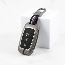 Load image into Gallery viewer, Metal Silicon Car Key case for  KIA Seltos | KIA Sonet | KIA Carens (3 Button Smart Key)