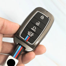 Load image into Gallery viewer, Metal Silicon Car Key Case for KIA Carens | Carnival | Seltos | Sonet  (4 Button Smart Key)