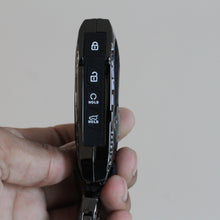 Load image into Gallery viewer, Premium Metal Black Transformer Series Soft Silicon Key Cover for Kia Seltos Facelift | Carens X Line | Sonet Facelift