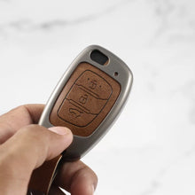 Load image into Gallery viewer, Metal Leather Key case for Hyundai Creta | Aura | i10 grand | Exter | Venue | Nios | Xcent | i20  (3 Button)
