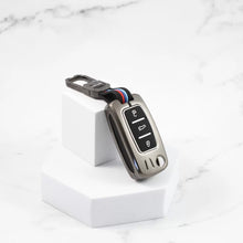 Load image into Gallery viewer, Metal Silicon Car Key case for Skoda Rapid | Yeti | Superb | Laura | Fabia | Octavia | Volkswagen Jetta | Vento | Polo | Ameo (3 Button)